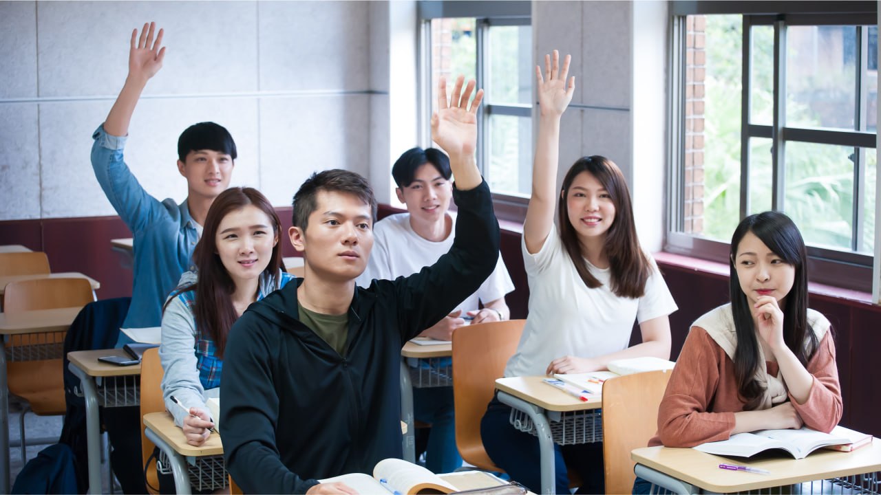 International students studying together in a classroom