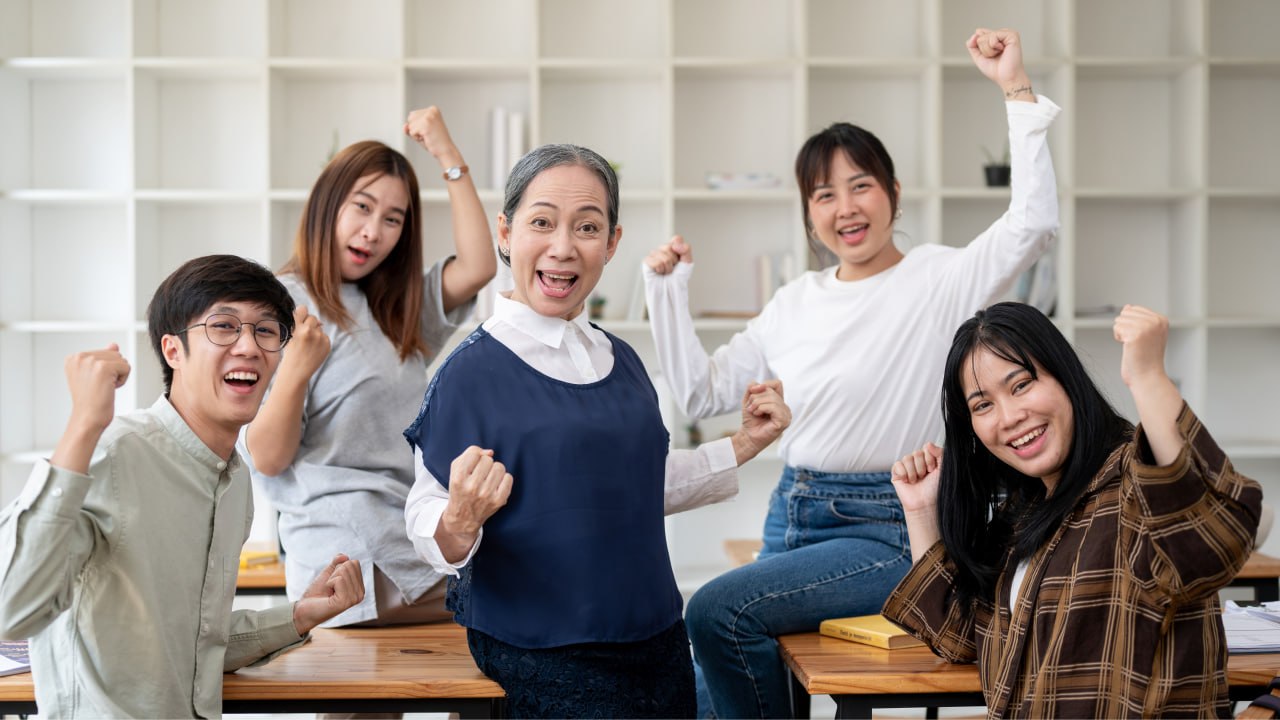 Students celebrating success at IBChinese.sg